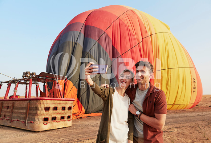 Deluxe hot air balloon ride Dubai with falconry breakfast and camel ride
